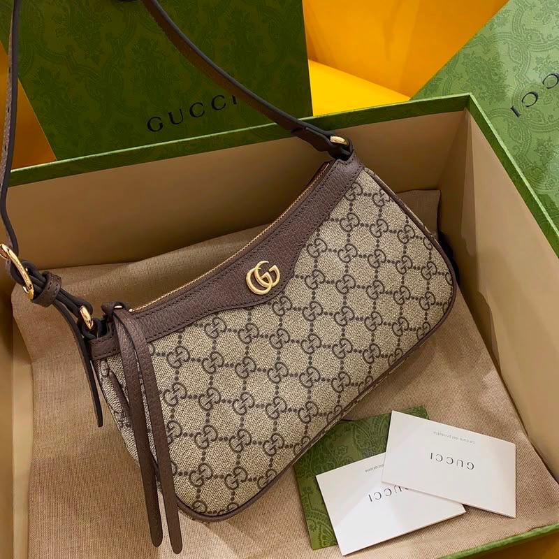 Bolsa de ombro estampada com detalhes marrons